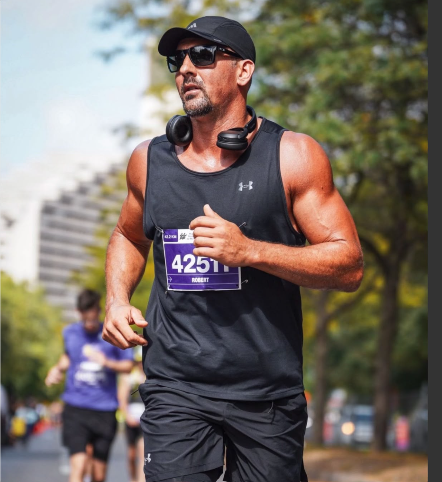 Robert "Coach Rob" Lanthier running a road race